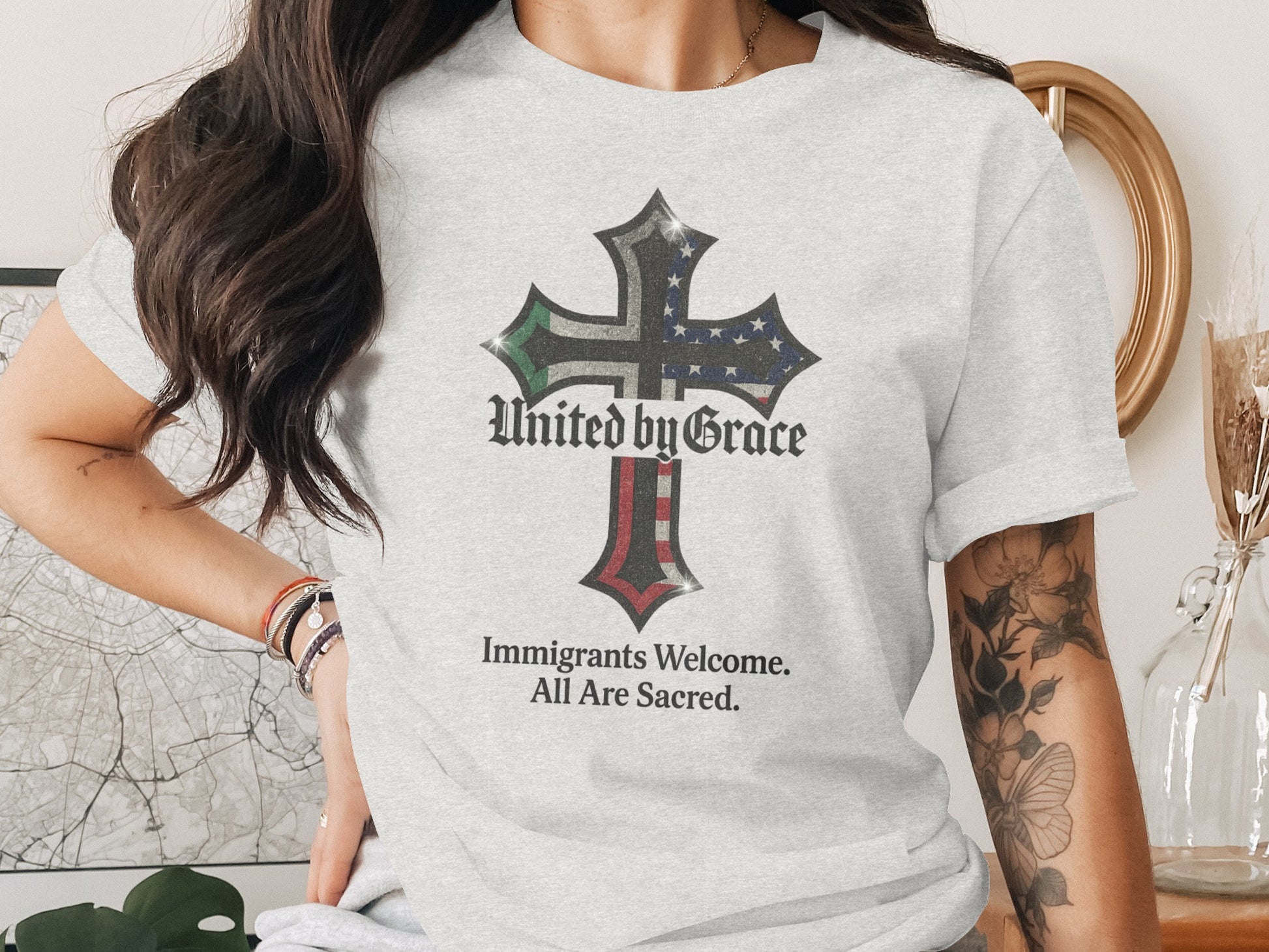 United by Grace Immigrants Welcome Sacred Product T-shirt