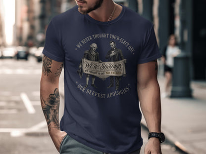 T-shirt with "We're so sorry, we forgot to say: no felons" text and historical figures.