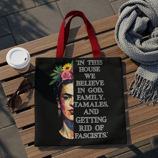 Black tote bag featuring Frida Kahlo portrait and text about faith, family, and tamales.