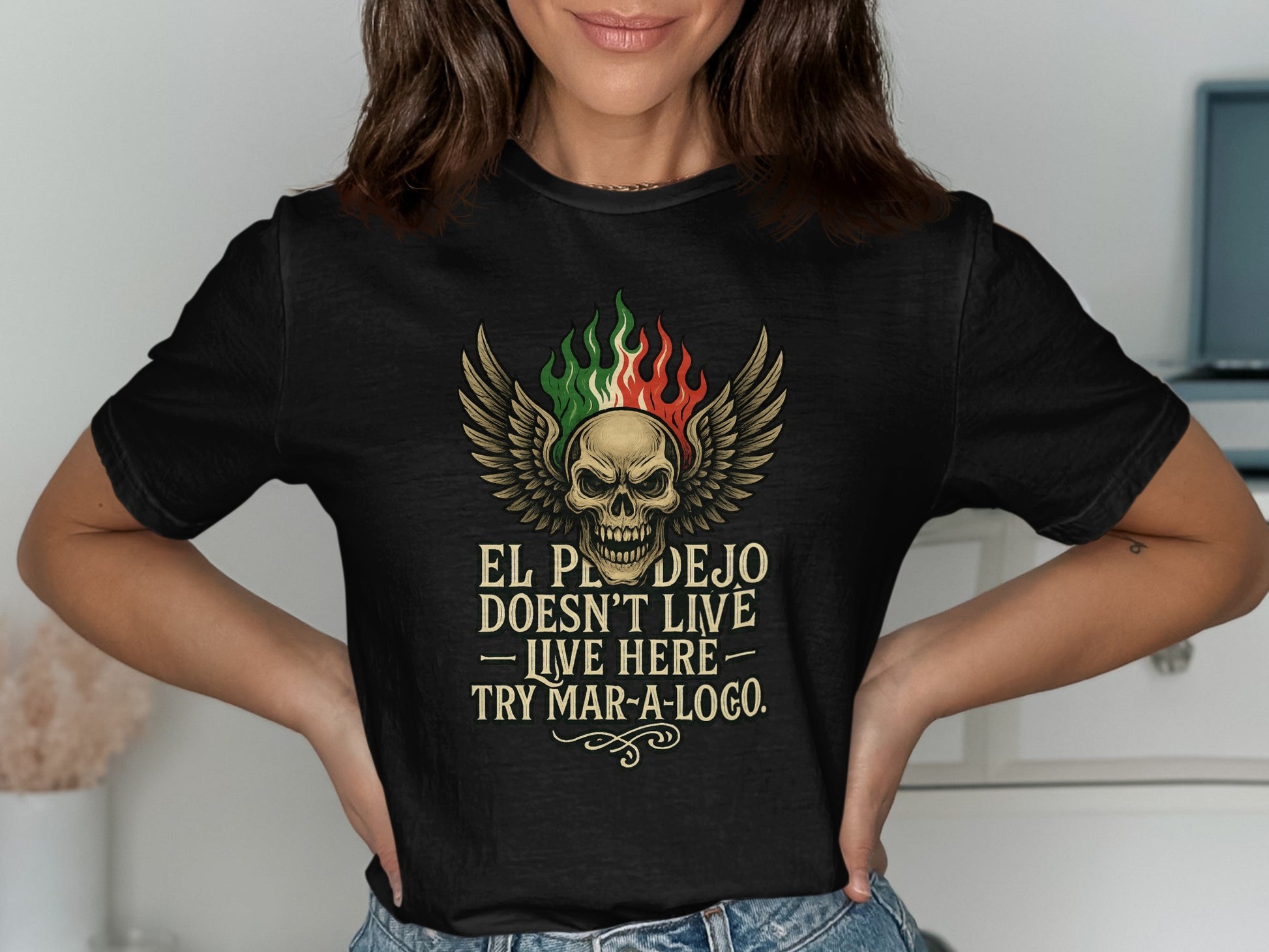 Skull Wings El Pe Dejo Doesn't Live Here T-Shirt product