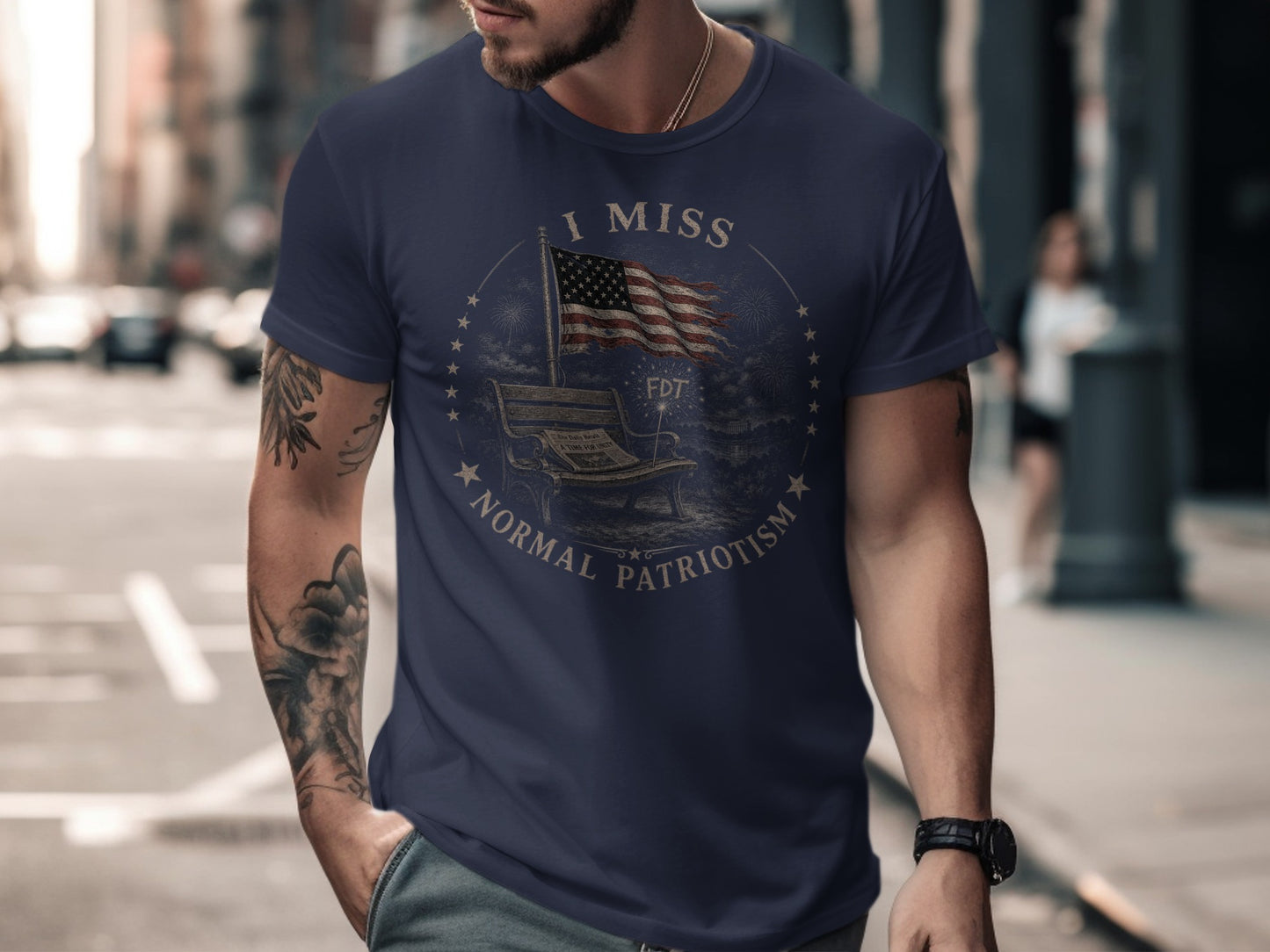 Dark blue t-shirt with "I MISS NORMAL PATRIOTISM" and US flag design.