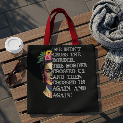 Black tote bag with Frida Kahlo art and quote.