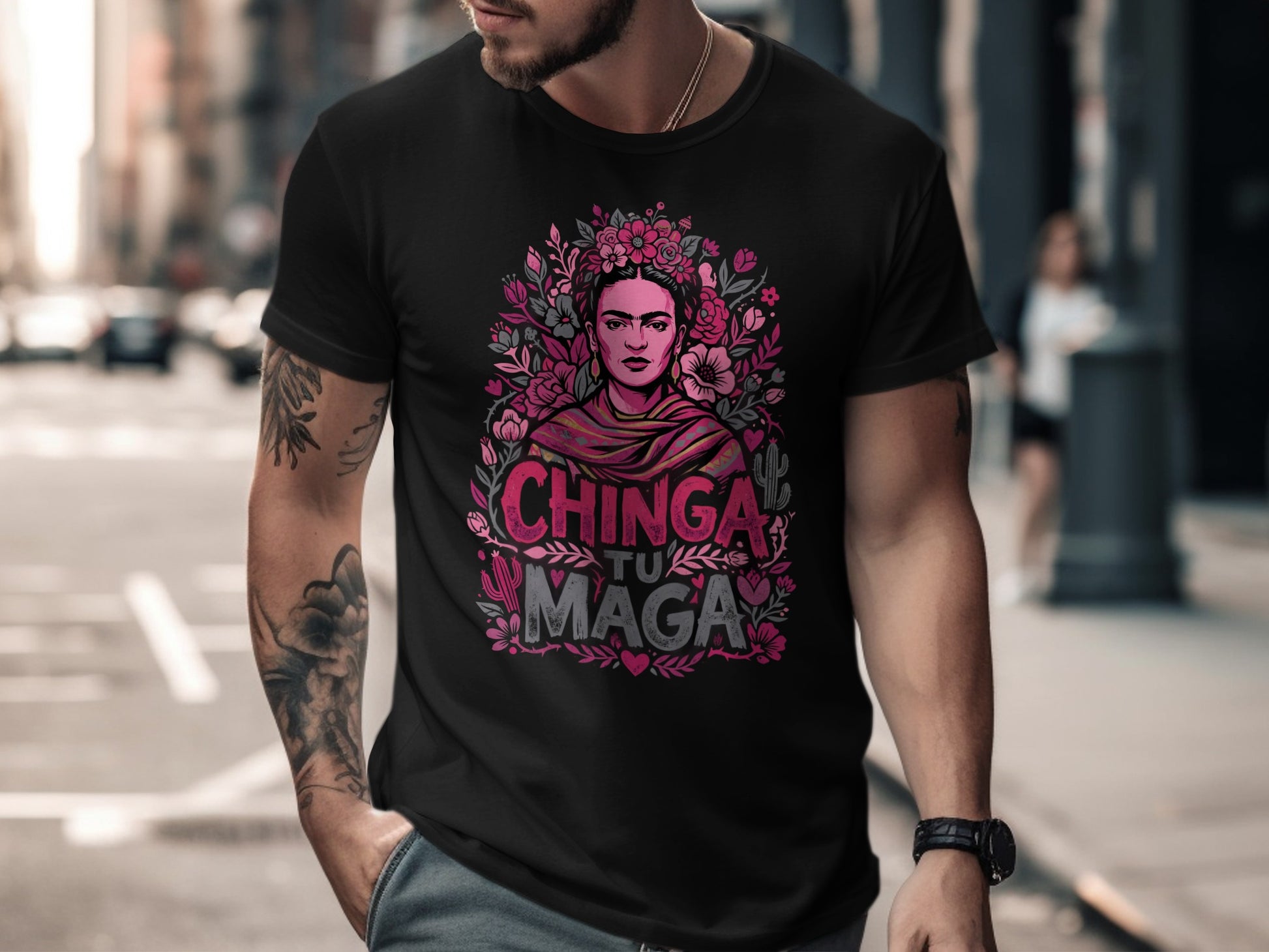 Black t-shirt with Frida Kahlo design and "Chinga Tu Maga" text.