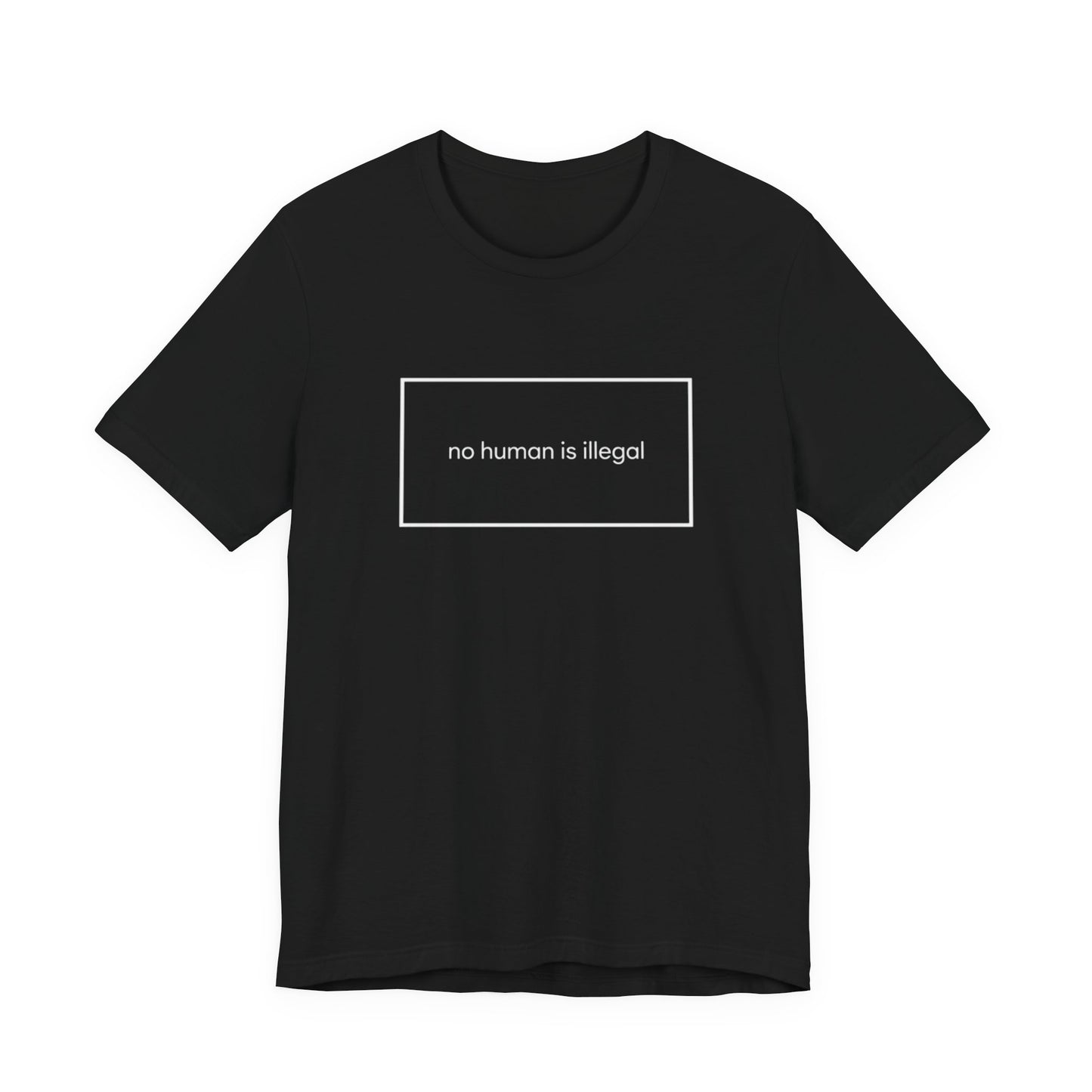 Black t-shirt with white text in a rectangle: "no human is illegal".