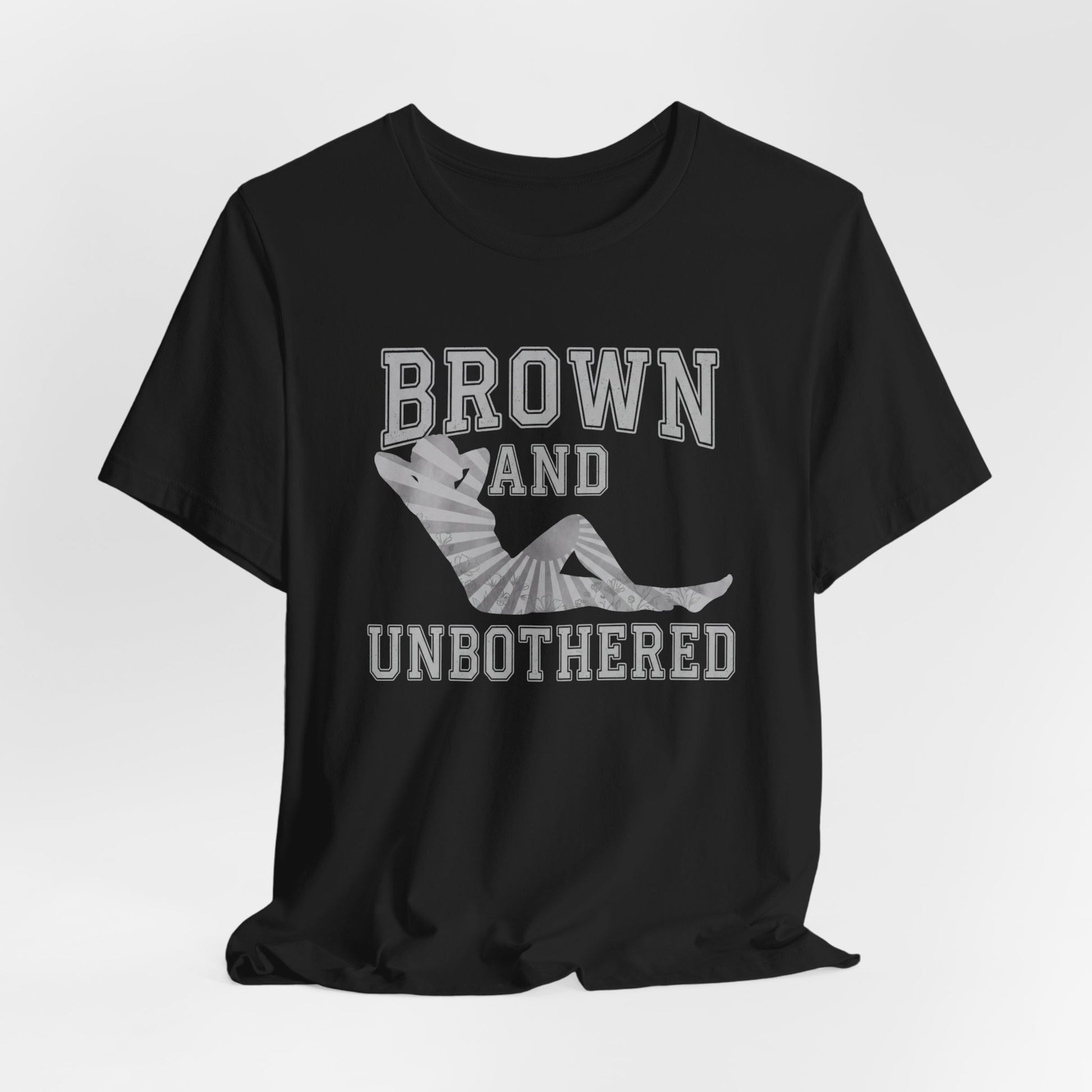Black t-shirt with "BROWN AND UN<bos> BOTHERED" text and sun ray graphic.