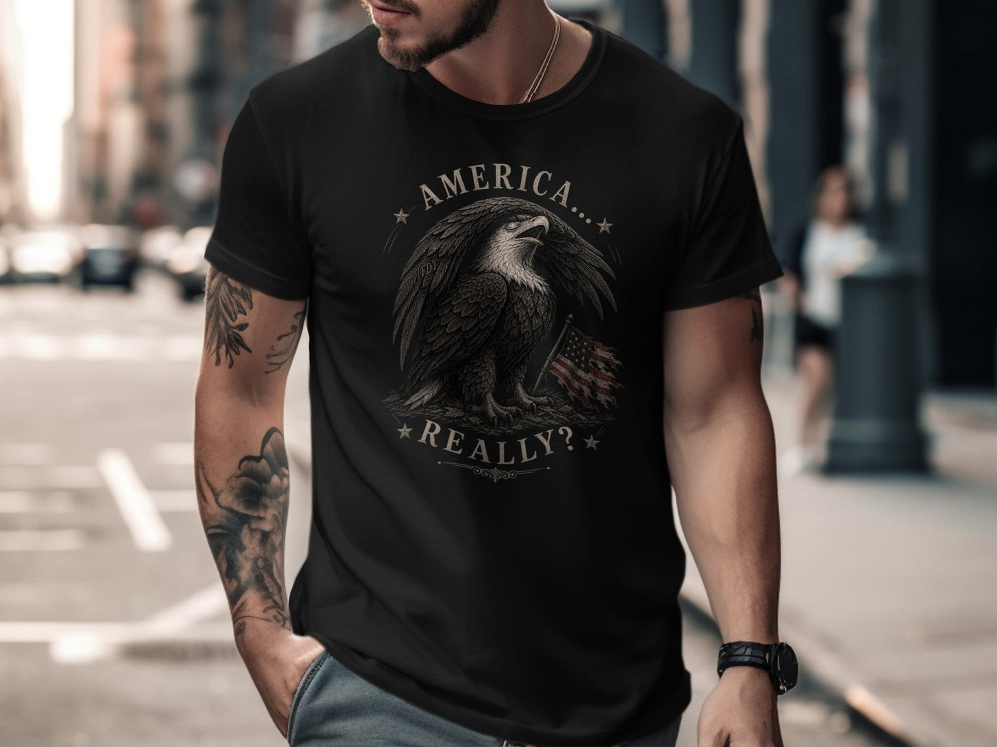 Black t-shirt with "AMERICA... REALLY?" text and eagle graphic.