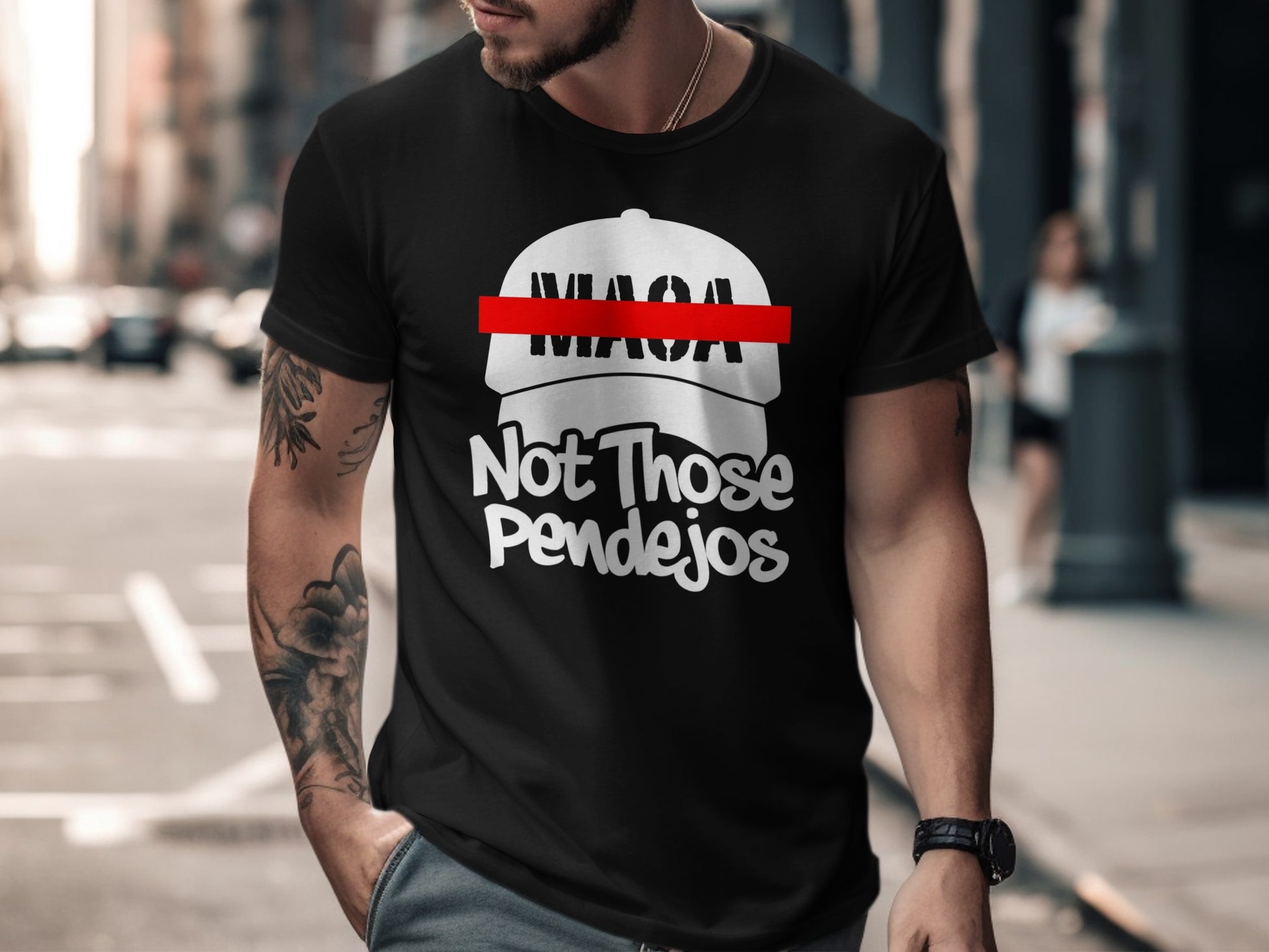 Black t-shirt with white text and red stripe: "MAGA Not Those Pendejos"