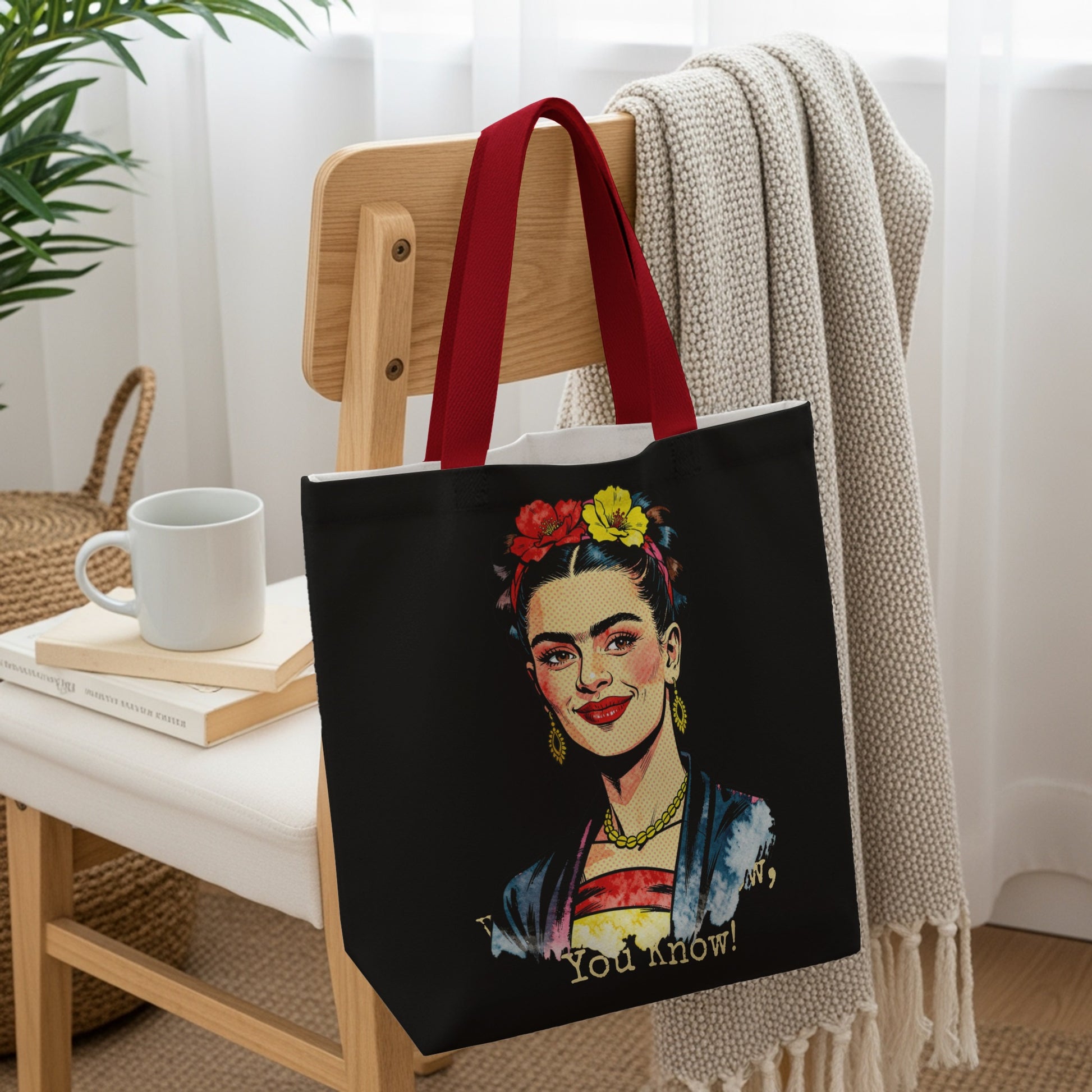 Black tote bag with Frida Kahlo portrait, red handles, and "You know!" text.