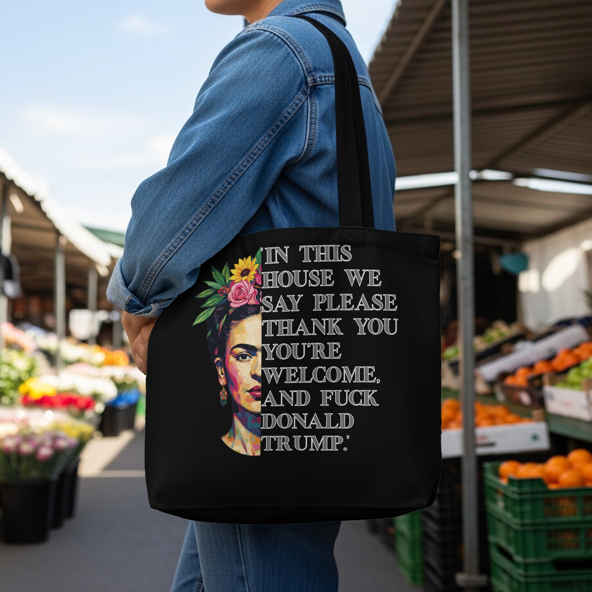 Black tote bag with Frida Kahlo and text about politeness and Donald Trump.