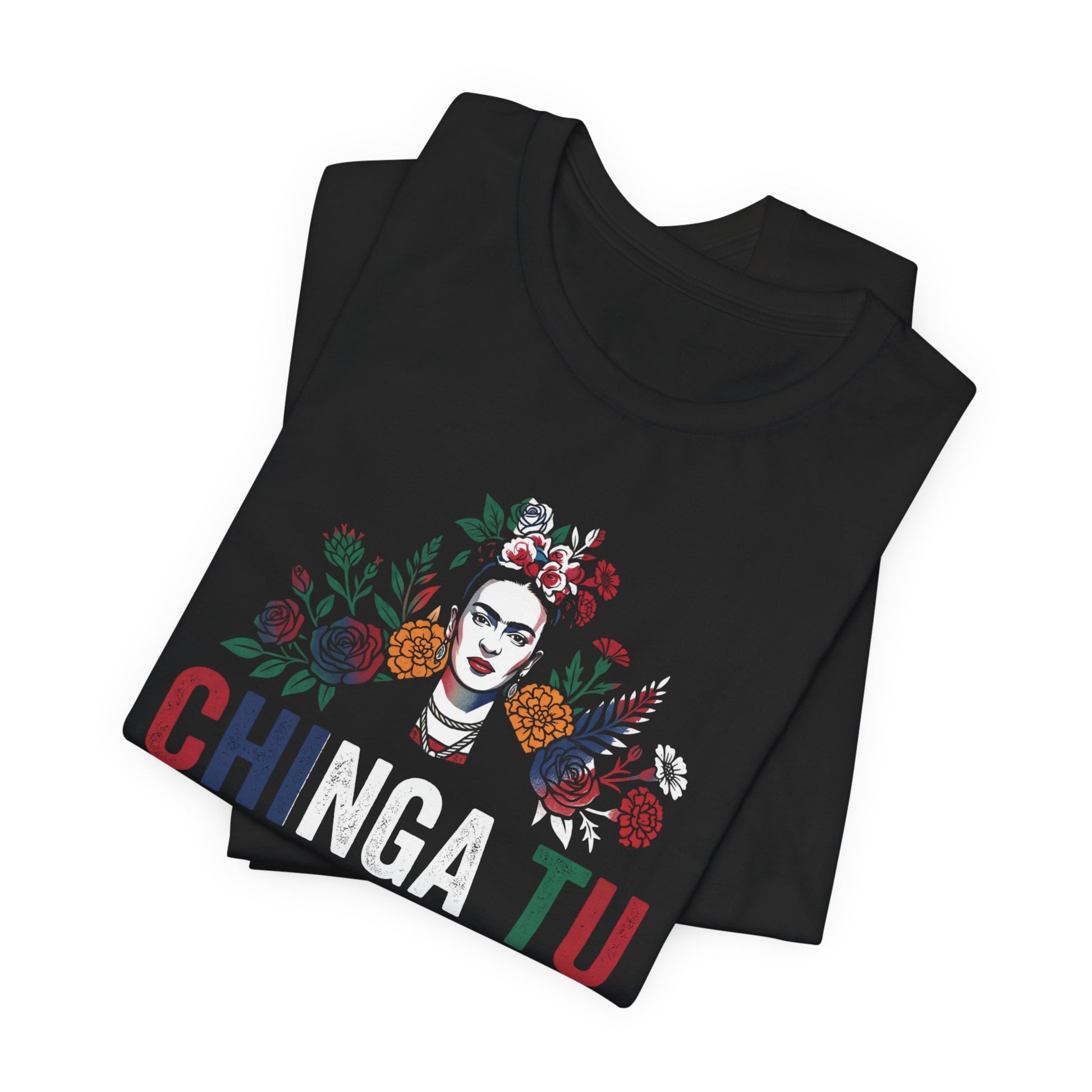 Black t-shirt with Frida Kahlo portrait and colorful floral accents, text reads "CHINGA TU".
