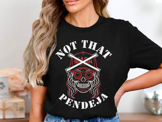 Black t-shirt with "NOT THAT PENDEJA" and a skull design.