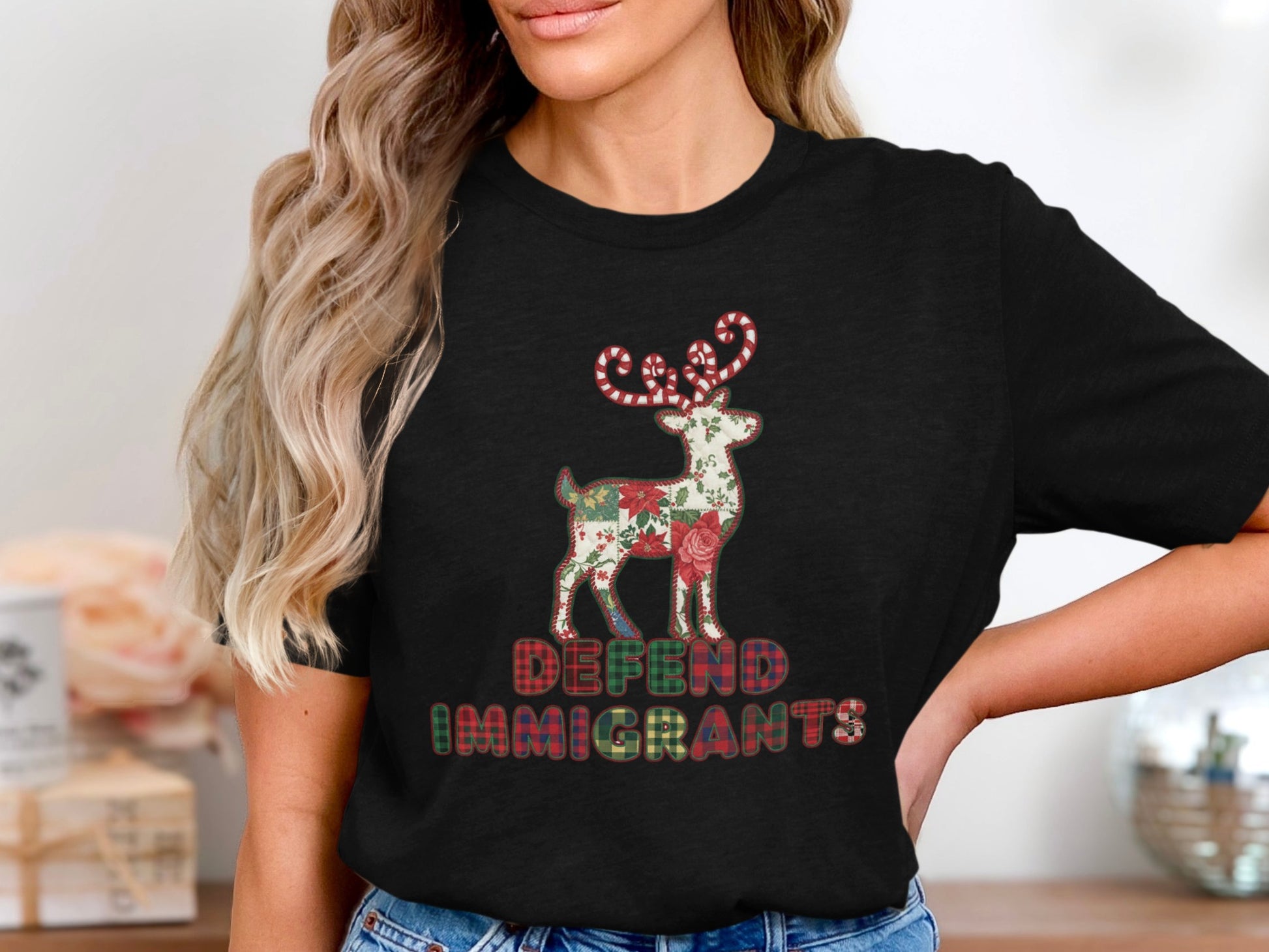Defend Immigrants Reindeer Graphic Tee product