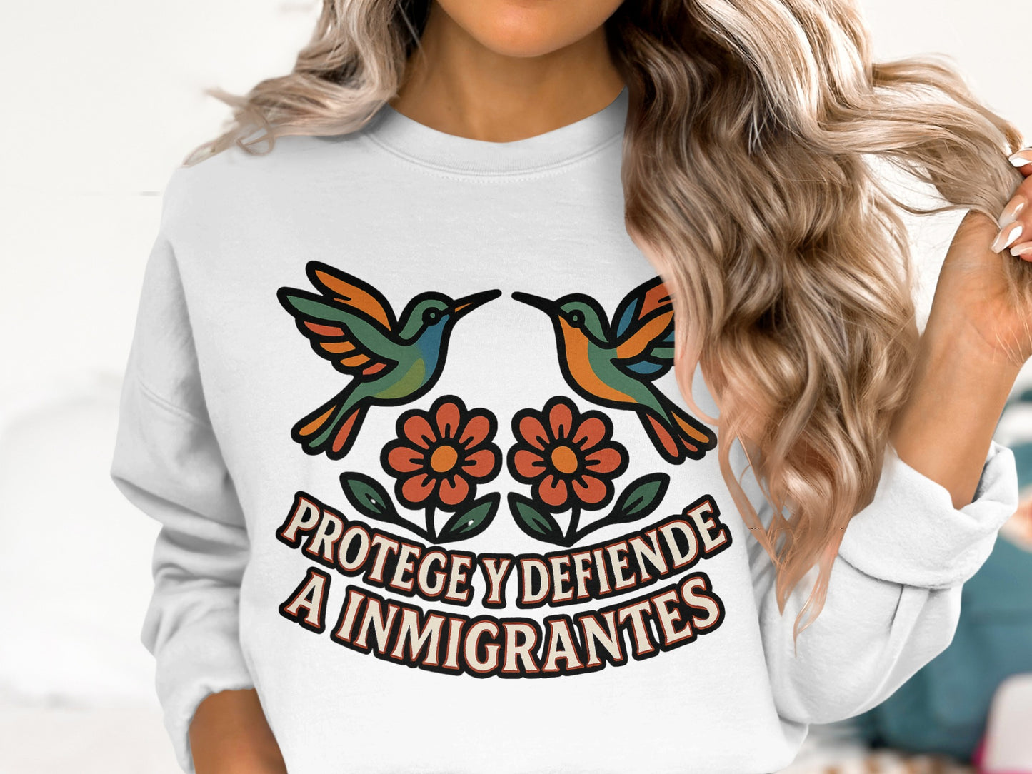 Protege Y Defiende A Inmigrantes Graphic Sweatshirt product type