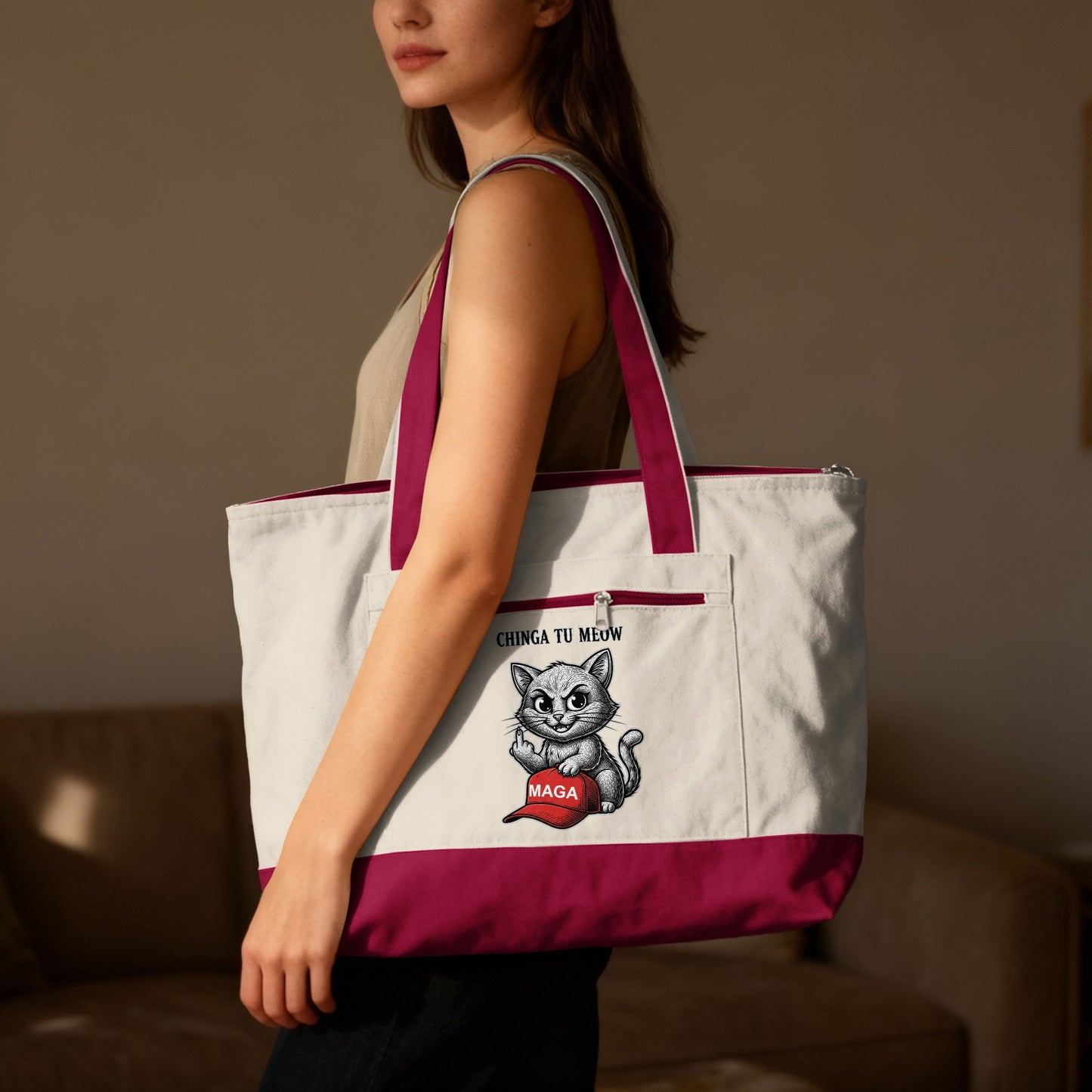 White canvas tote bag with maroon trim and a cartoon cat with "MAGA" text.
