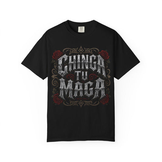 A black t-shirt with a graphic design featuring the text "CHINGA TU MAGA" in an ornate, decorative font.