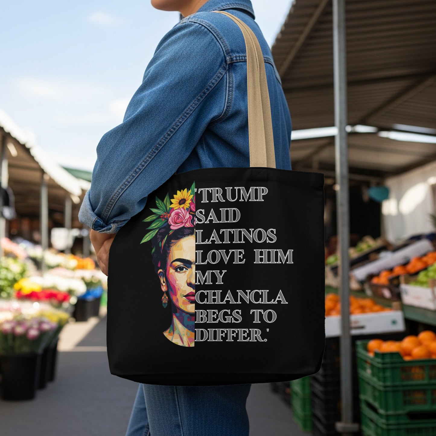 Black tote bag with colorful portrait and text TRUMP SAID LATINOS LOVE HIM MY CHANCLA BEGS TO DIFFER.