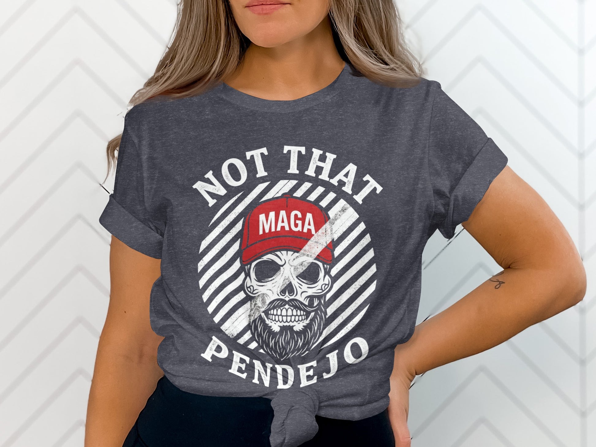 Gray t-shirt with skull graphic and text "NOT THAT PENDEJO"