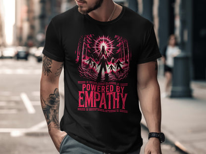 Black t-shirt with "POWERED BY EMPATHY" text and a forest silhouette graphic.