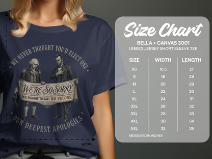 Navy t-shirt with "We're So Sorry" text and a size chart.