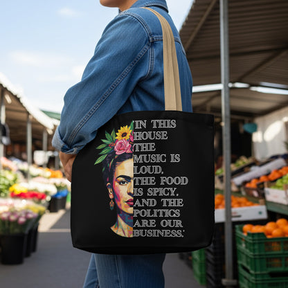 Black tote bag with Frida Kahlo and quote about music, food, and politics.