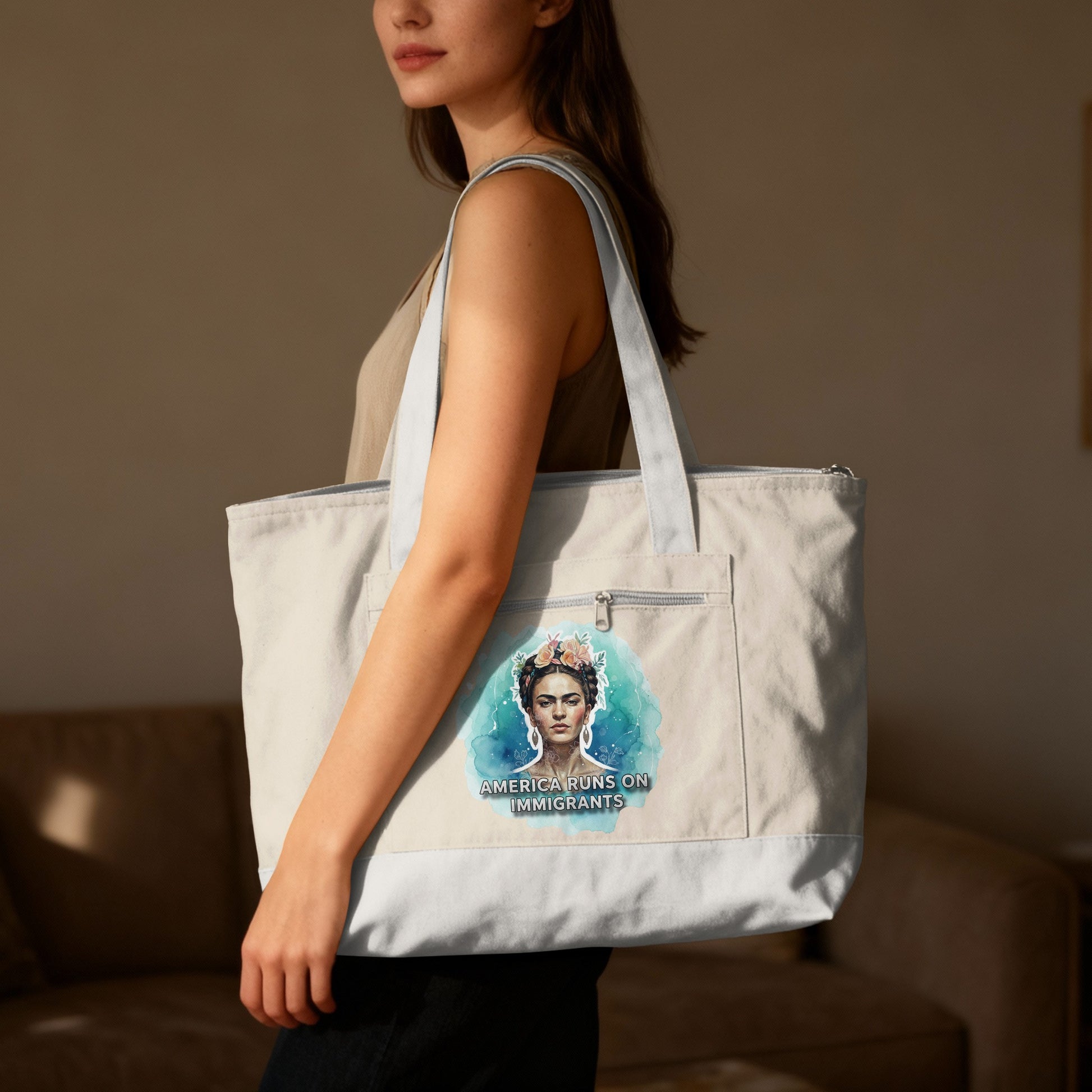 Tote bag with Frida Kahlo graphic and text "America Runs on Immigrants".