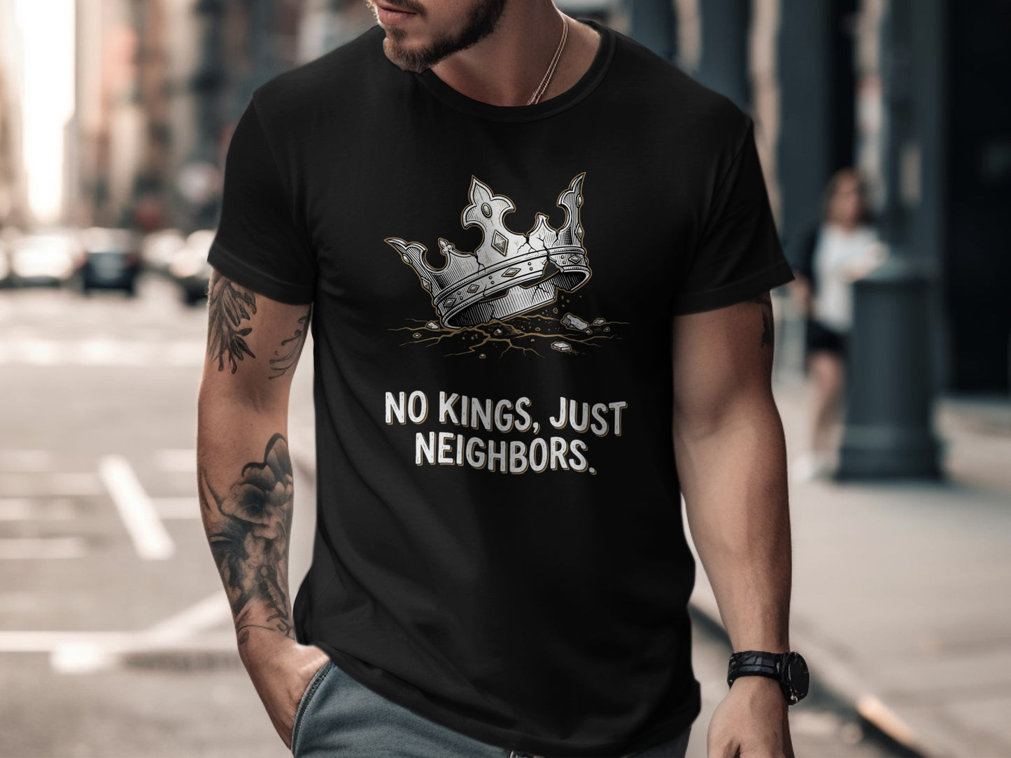 Black t-shirt with crown graphic and text "NO KINGS, JUST NEIGHBORS."