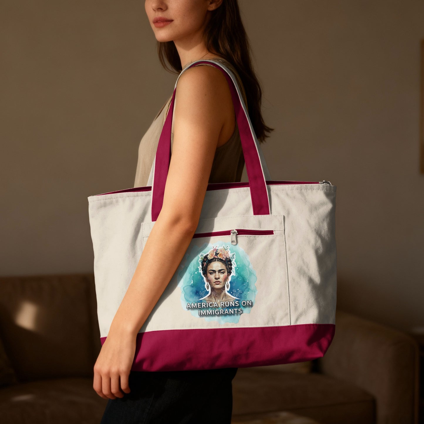 Tote bag with Frida Kahlo illustration and "AMERICA RUNS ON IMMIGRANTS" text.