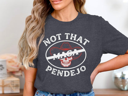 Dark t-shirt with "NOT THAT MAGA PENDEJO" and skull graphic.
