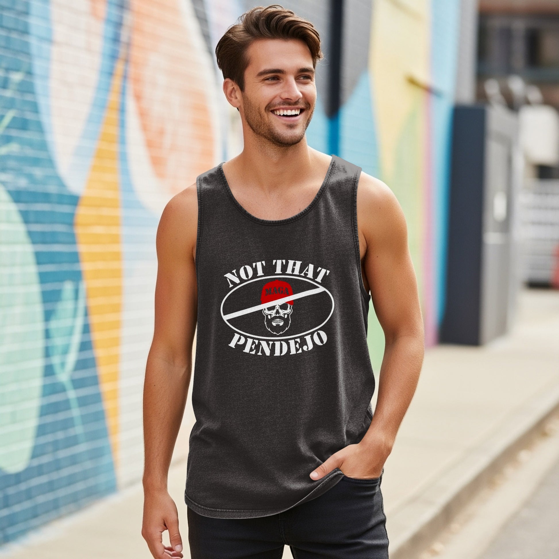 Man in dark tank top with "NOT THAT PENDEJO" graphic and skull.