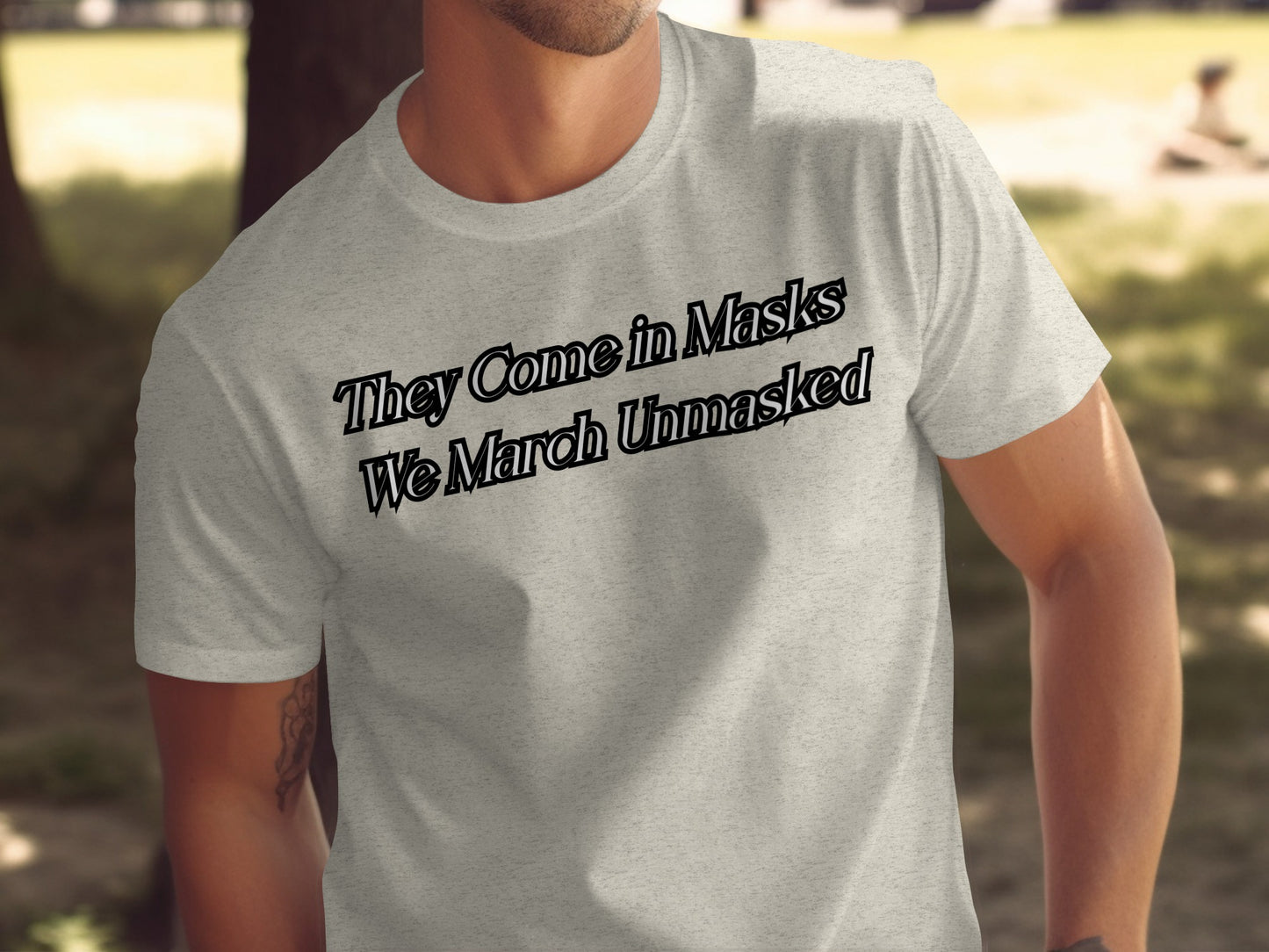 They Come In Masks We March Unmasked T-shirt product