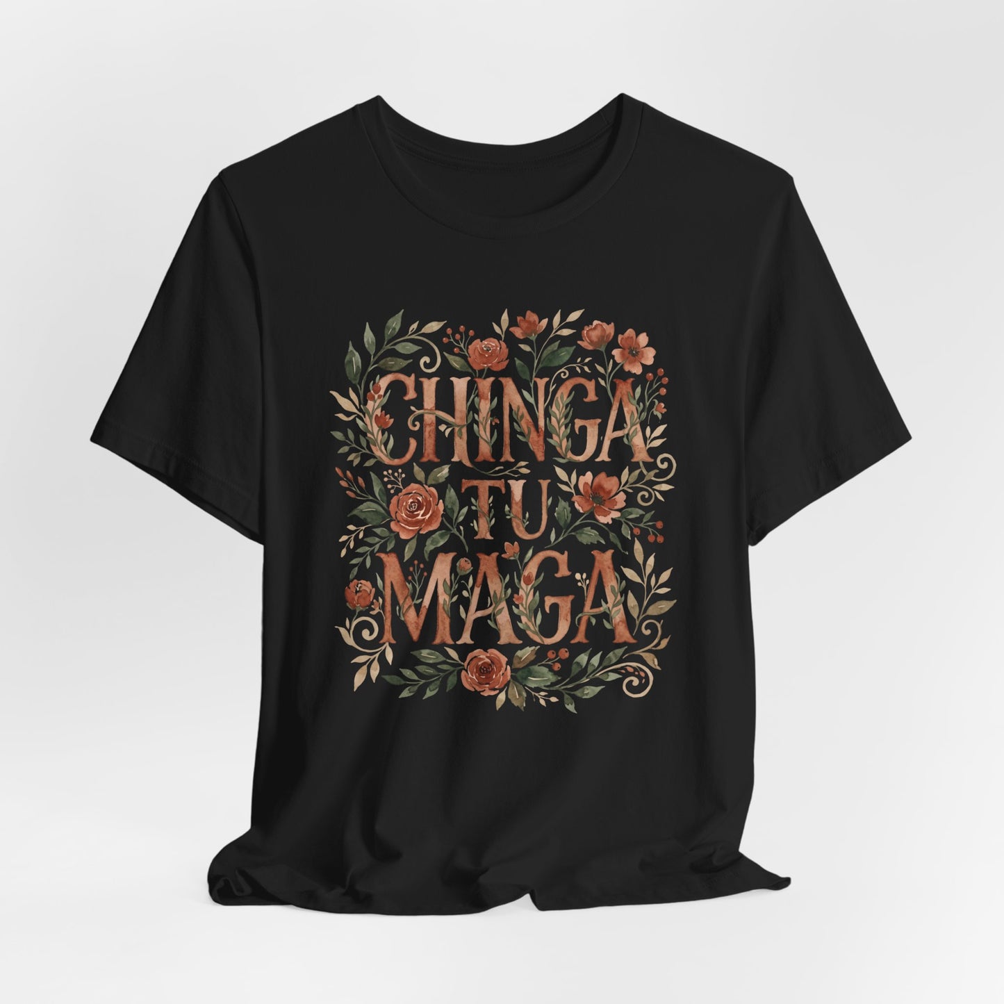 Black t-shirt with floral design and "Chinga Tu Maga" text.