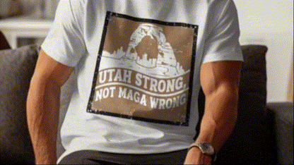 A person wearing a white t-shirt with a graphic design on it.