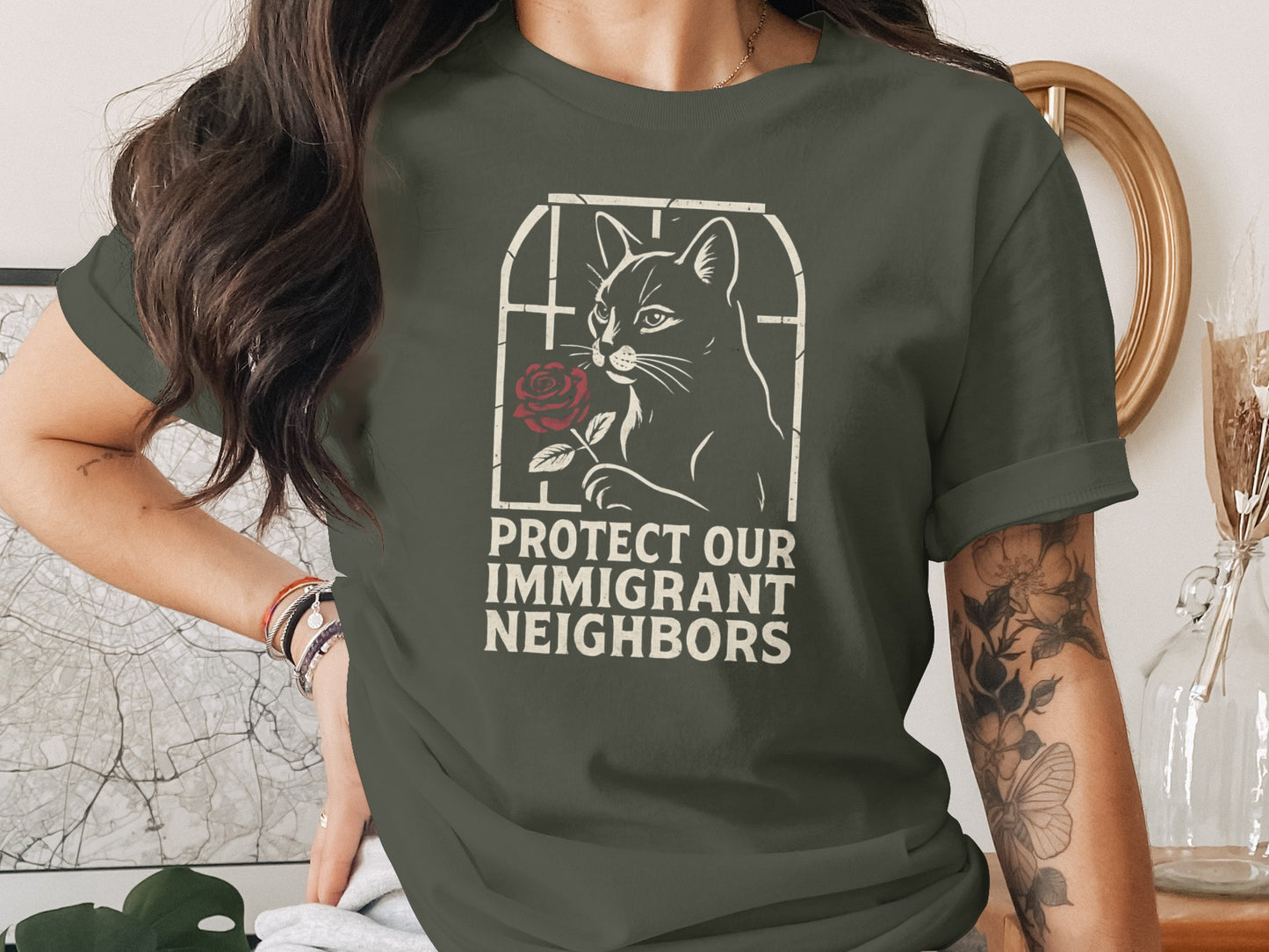 Protect Our Immigrant Neighbors Cat Graphic Shirt