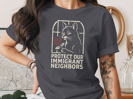 Protect Our Immigrant Neighbors Cat Graphic Tee