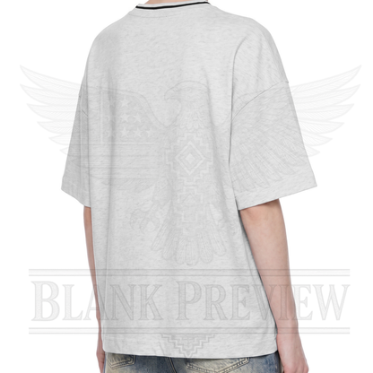 the back of a person wearing a grey t-shirt with a graphic design on the back.