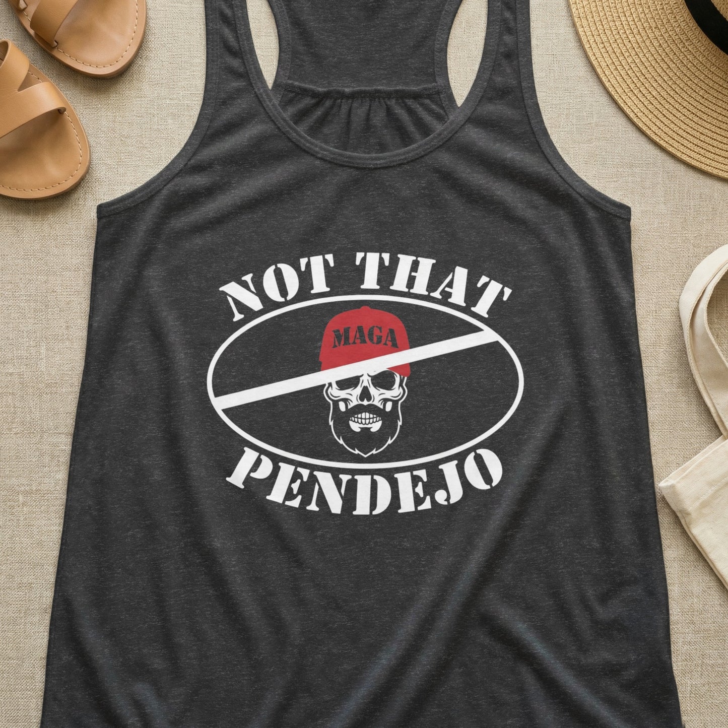 Dark gray tank top with "NOT THAT PENDEJO" and a skull graphic with a MAGA hat.