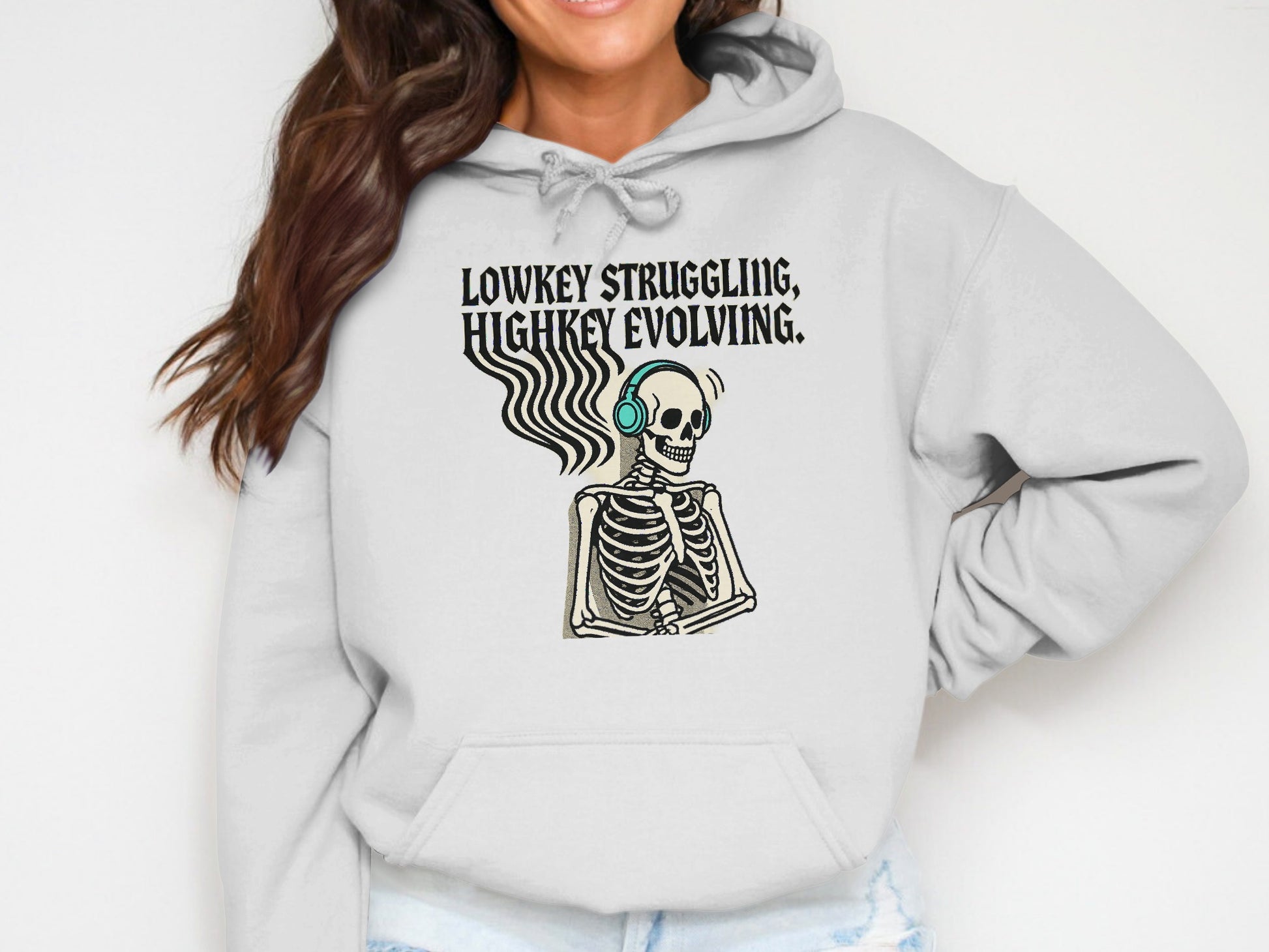 Lowkey Struggling Highkey Evolving Graphic Hoodie product type
