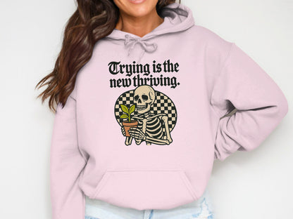 Trying is the new thriving skeleton hoodie product