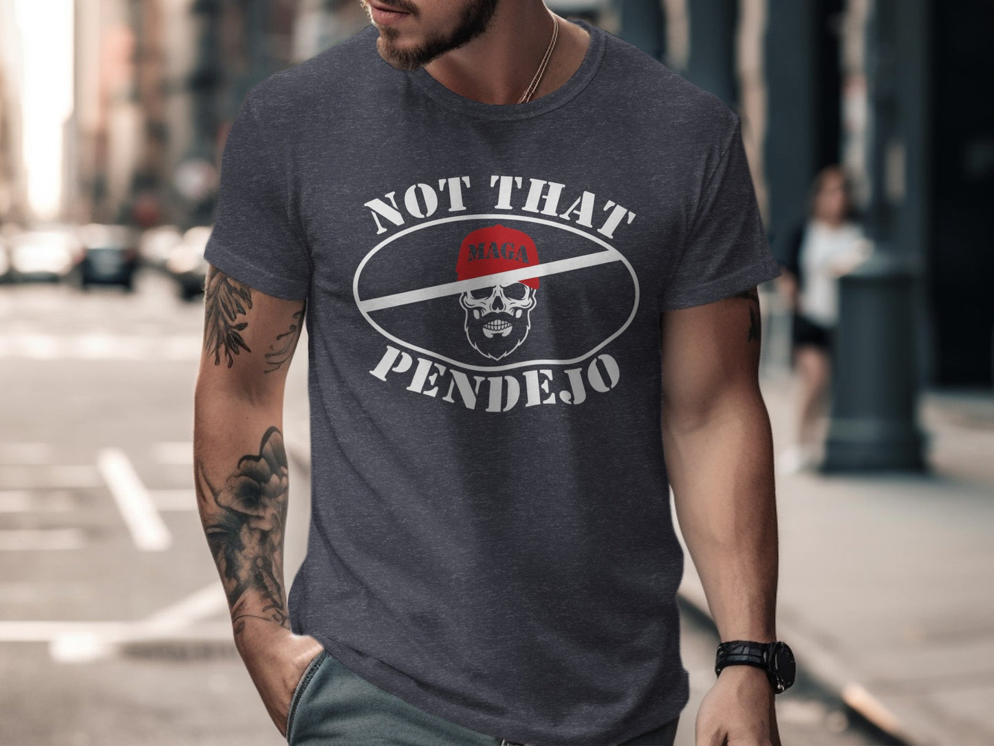 Dark t-shirt with "MAGA PENDEJO" text and skull graphic.