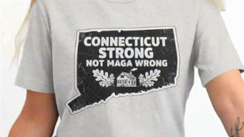 A person wearing a gray t-shirt with a black and white graphic design that says "Connecticut Strong Not Maga Wrong".