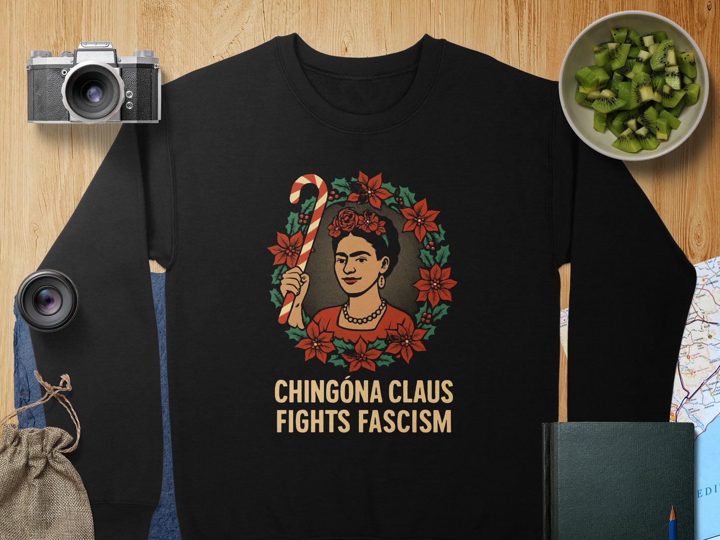 Chingona Claus Fights Fascism Graphic Apparel Product