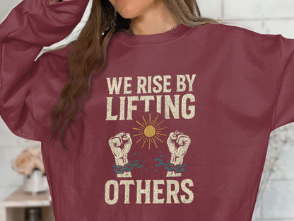We Rise By Lifting Others Graphic Sweatshirt product