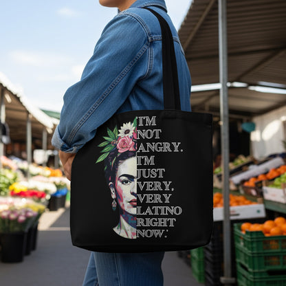 Black tote bag with Frida Kahlo portrait and quote "I'm not angry. I'm just very, very latino right now."