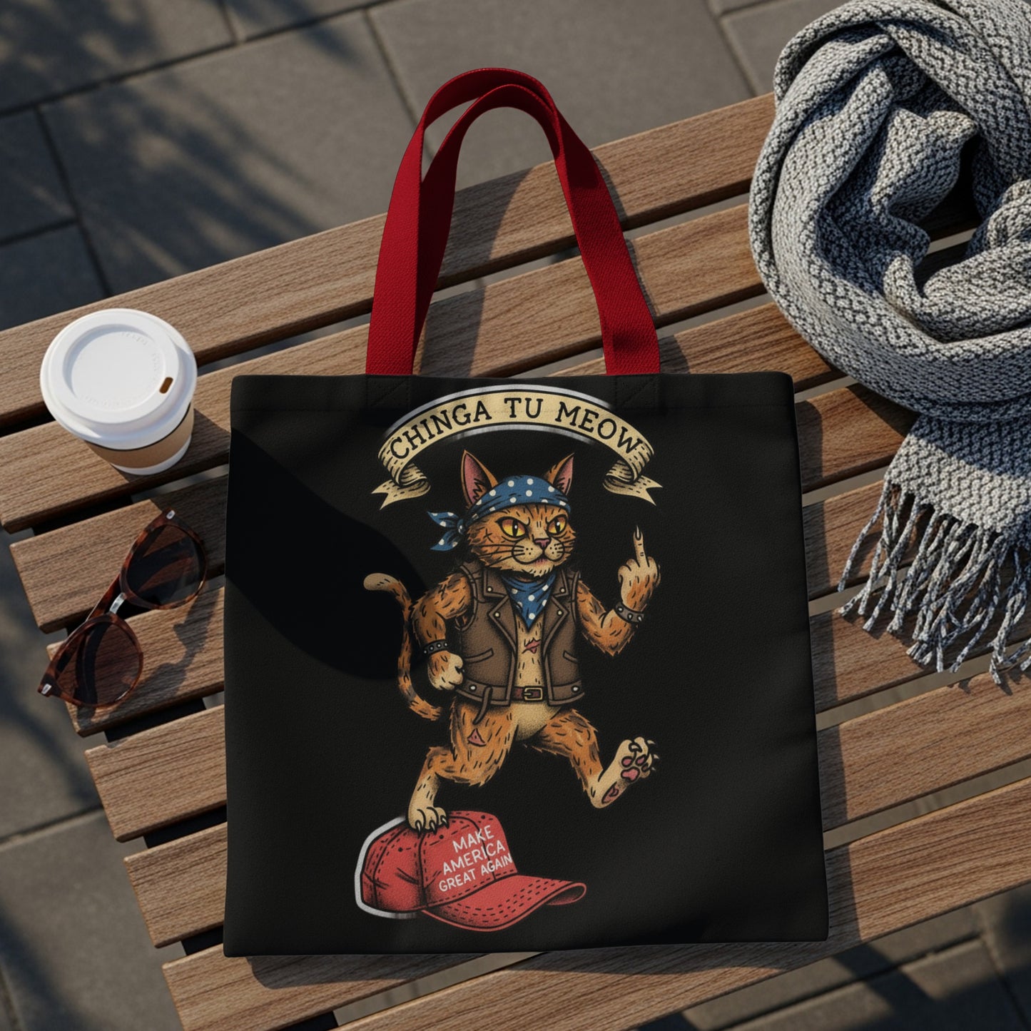 Tote bag with cat wearing bandana and leather jacket, giving middle finger.