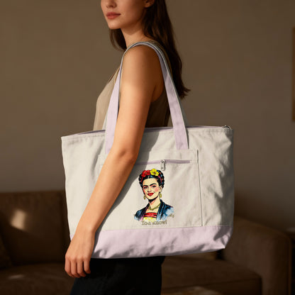 Tote bag with Frida Kahlo portrait and colorful flowers.