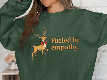 Fueled by empathy reindeer graphic sweatshirt