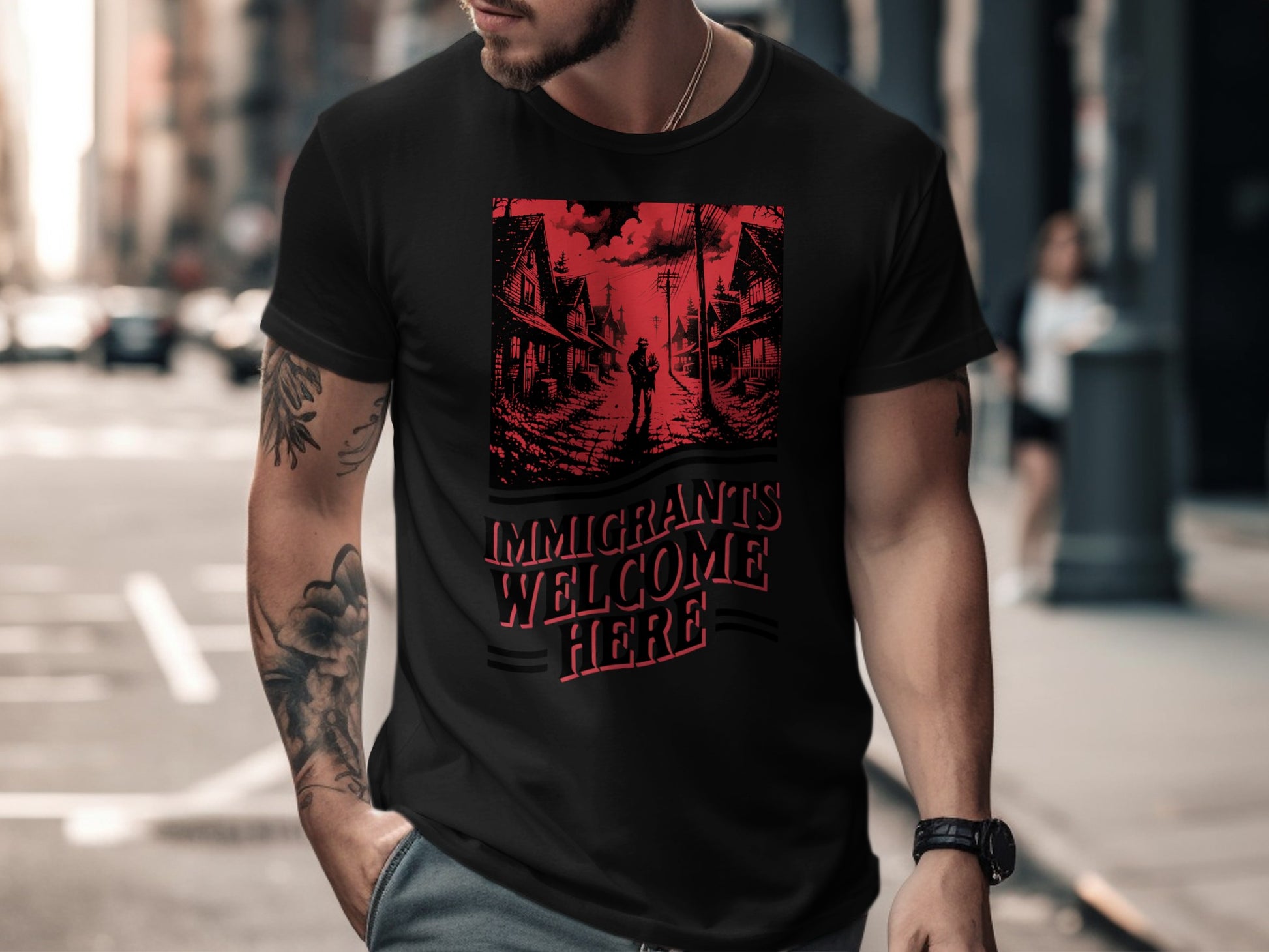 Black t-shirt with "Immigrants Welcome Here" text and red graphic.