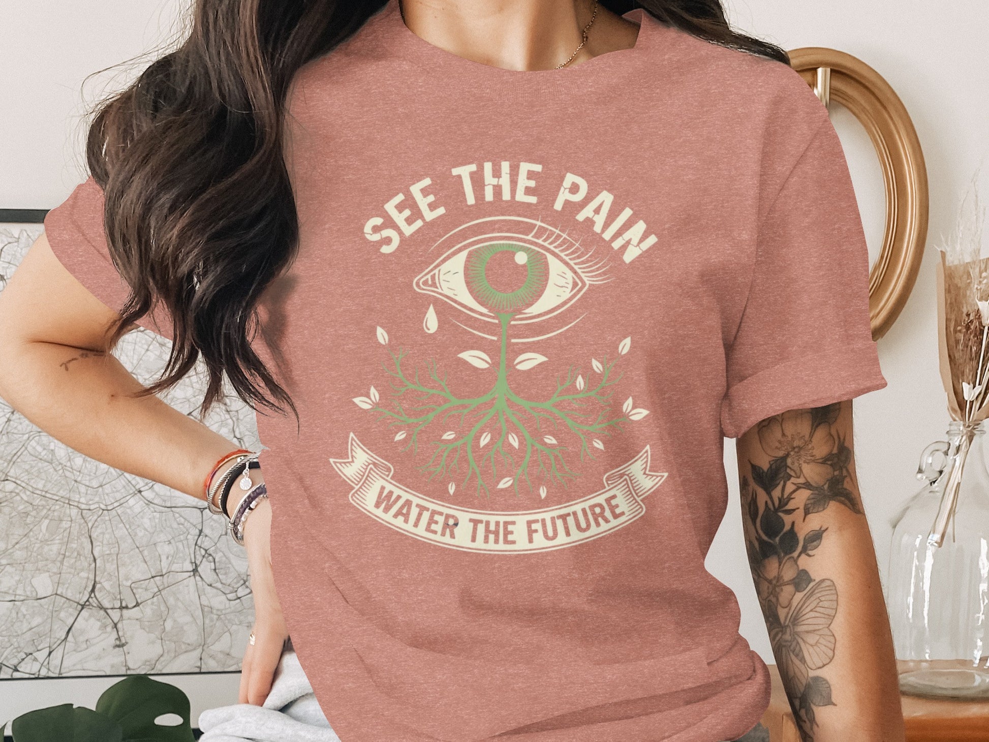 See the Pain Water the Future Graphic Tee product