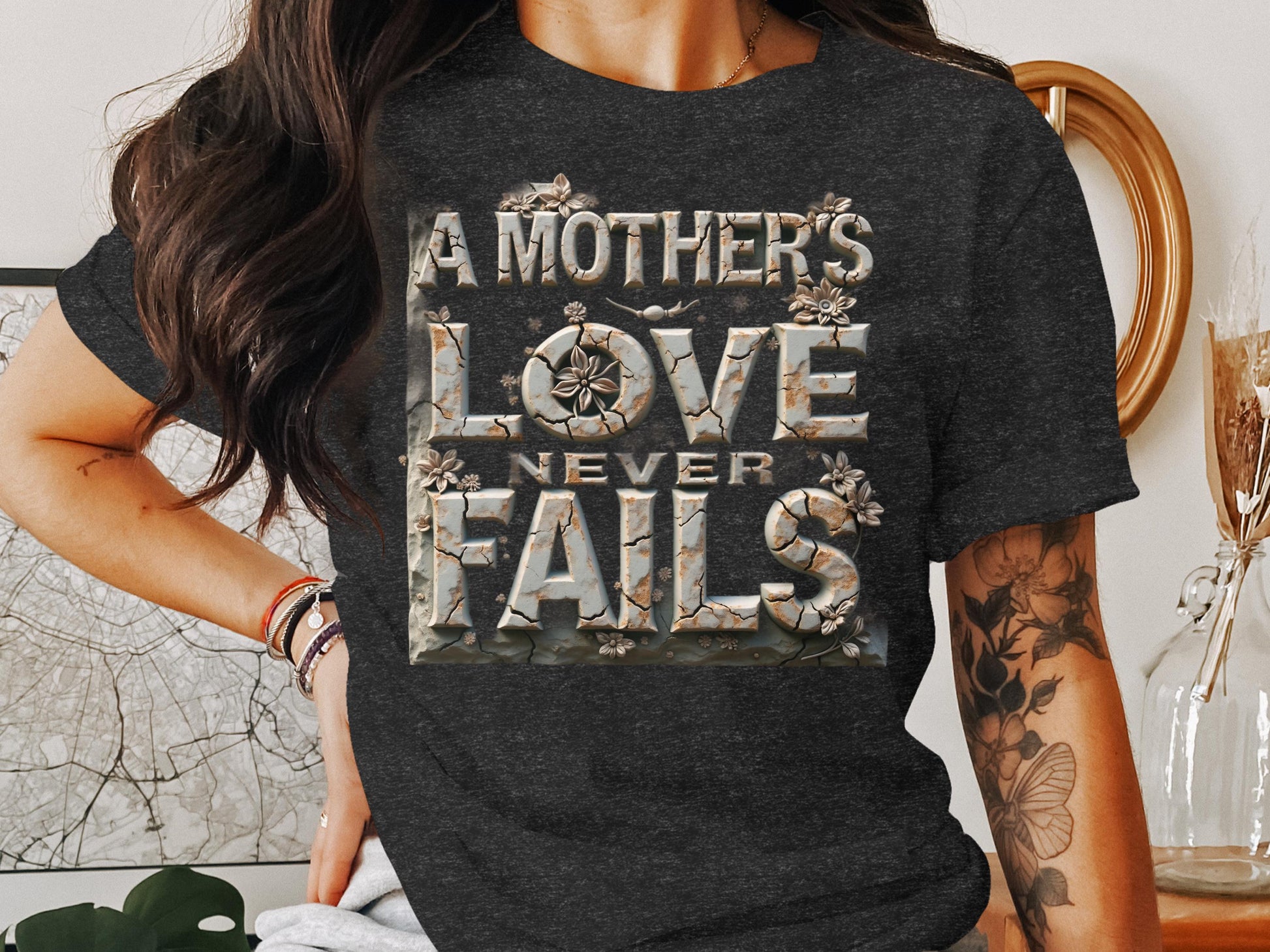 A Mother's Love Never Fails Graphic Tee product