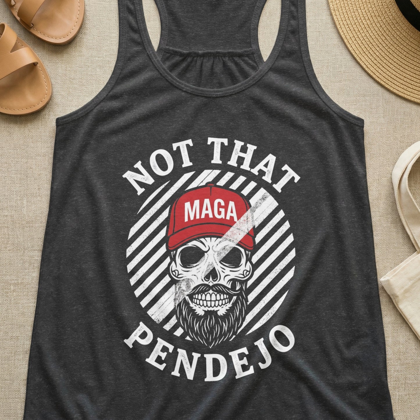Dark gray tank top with skull wearing a MAGA hat, text reads "NOT THAT PENDEJO".